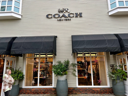 Coach Store In Beige With Flowers