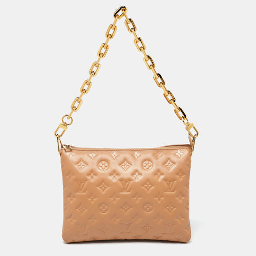Taupe Monogram Embossed Leather Coussin PM Bag