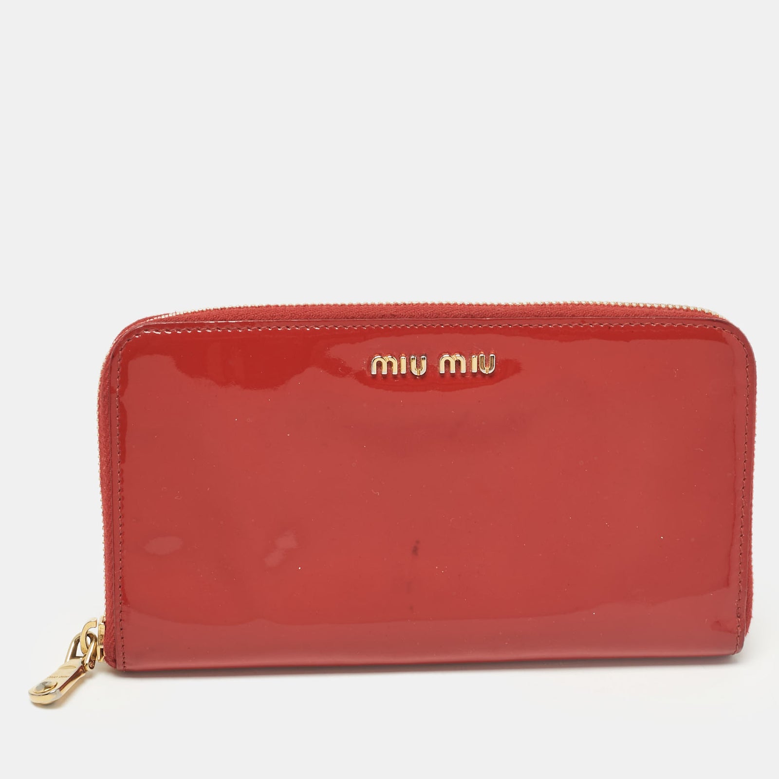 Miu Miu Portefeuille continental zippé en cuir verni rouge