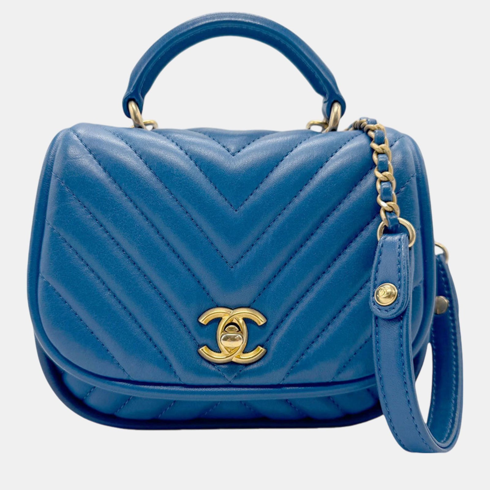 Chanel Blau-goldfarbene Lederhandtasche mit V-Stich