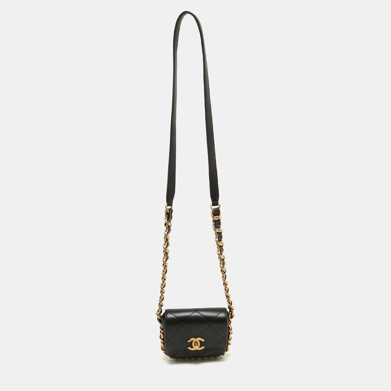 Chanel Schwarze, gesteppte Mini-Flap-Tasche aus Leder mit Kettenriemen