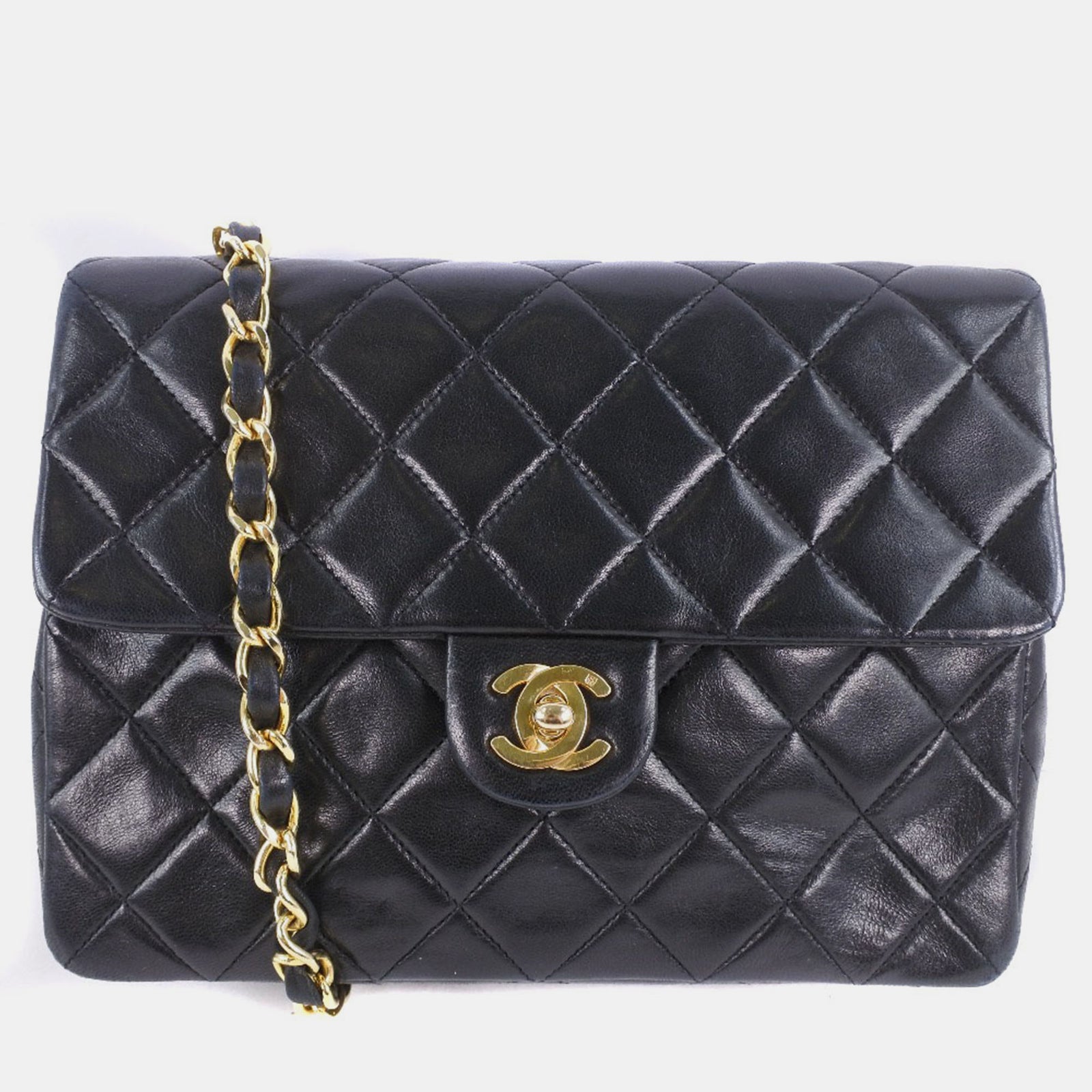 Chanel Mini sac à bandoulière classique à rabat simple en cuir noir