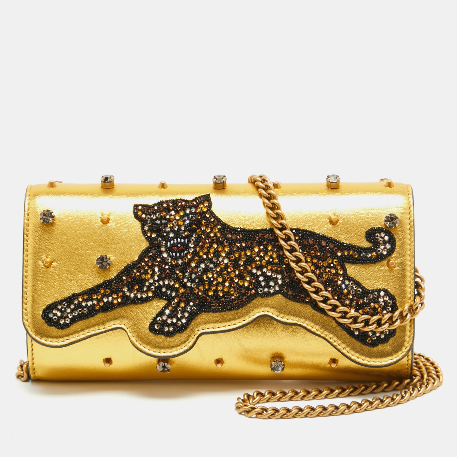 Gucci Clutch aus goldenem Leder mit Tiger-Stickerei und Kristallbesatz