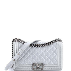 src:https://cdn.shopify.com/s/files/1/0384/0161/files/432508-1_20chanel_20boy_20flap_20bag_20quilted_20metallic_20calfskin_20old_20medium_2d_0002.jpg