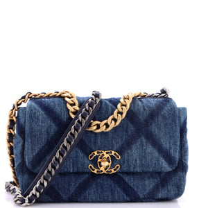 src:https://cdn.shopify.com/s/files/1/0384/0161/files/451474-1_20chanel_2019_20flap_20bag_20quilted_20denim_20medium_2d_0002.jpg