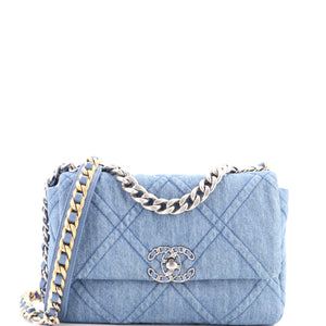 src:https://cdn.shopify.com/s/files/1/0384/0161/files/454922-70_20chanel_2019_20flap_20bag_20quilted_20denim_20medium_2d_0002.jpg