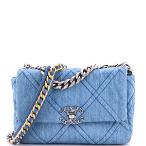 src:https://cdn.shopify.com/s/files/1/0384/0161/files/467365-4_20chanel_2019_20flap_20bag_20quilted_20denim_20medium_2d_0002.jpg