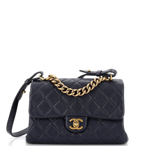 CHANEL Trapezio Flap Bag Quilted Sheepskin Small