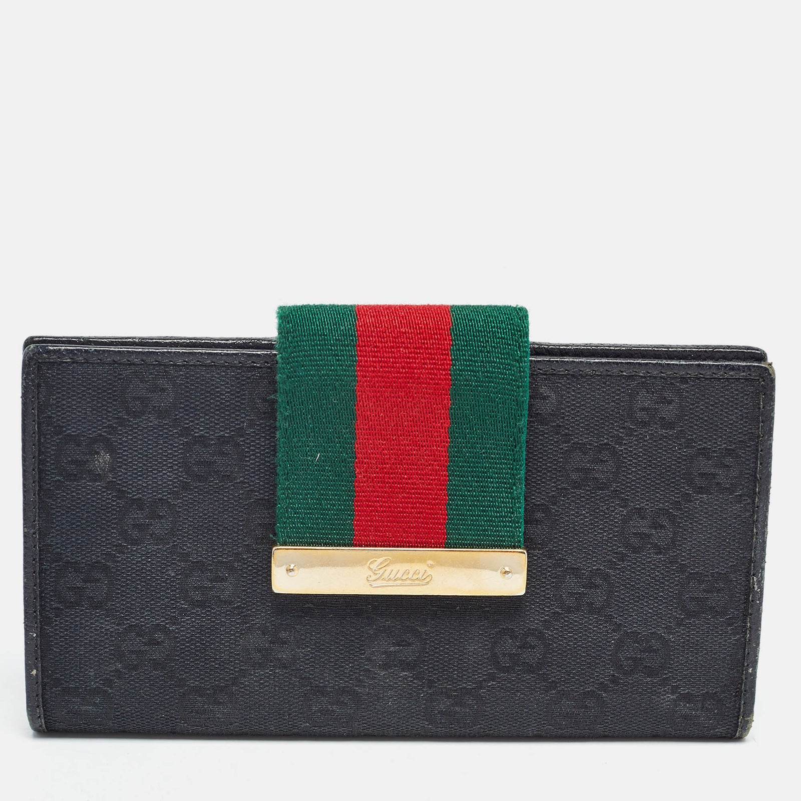 Gucci Portefeuille à rabat en toile GG noire et cuir