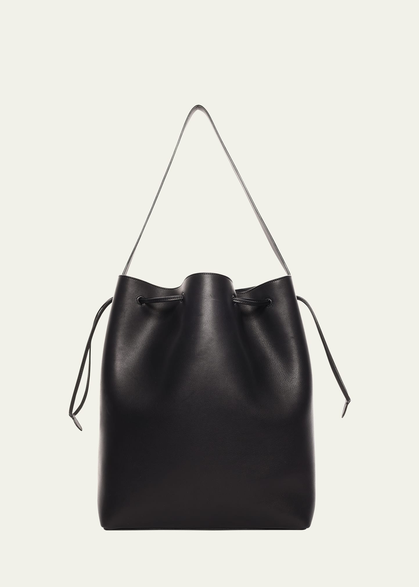 The Row Belvedere Bucket Bag in Saddle Leather