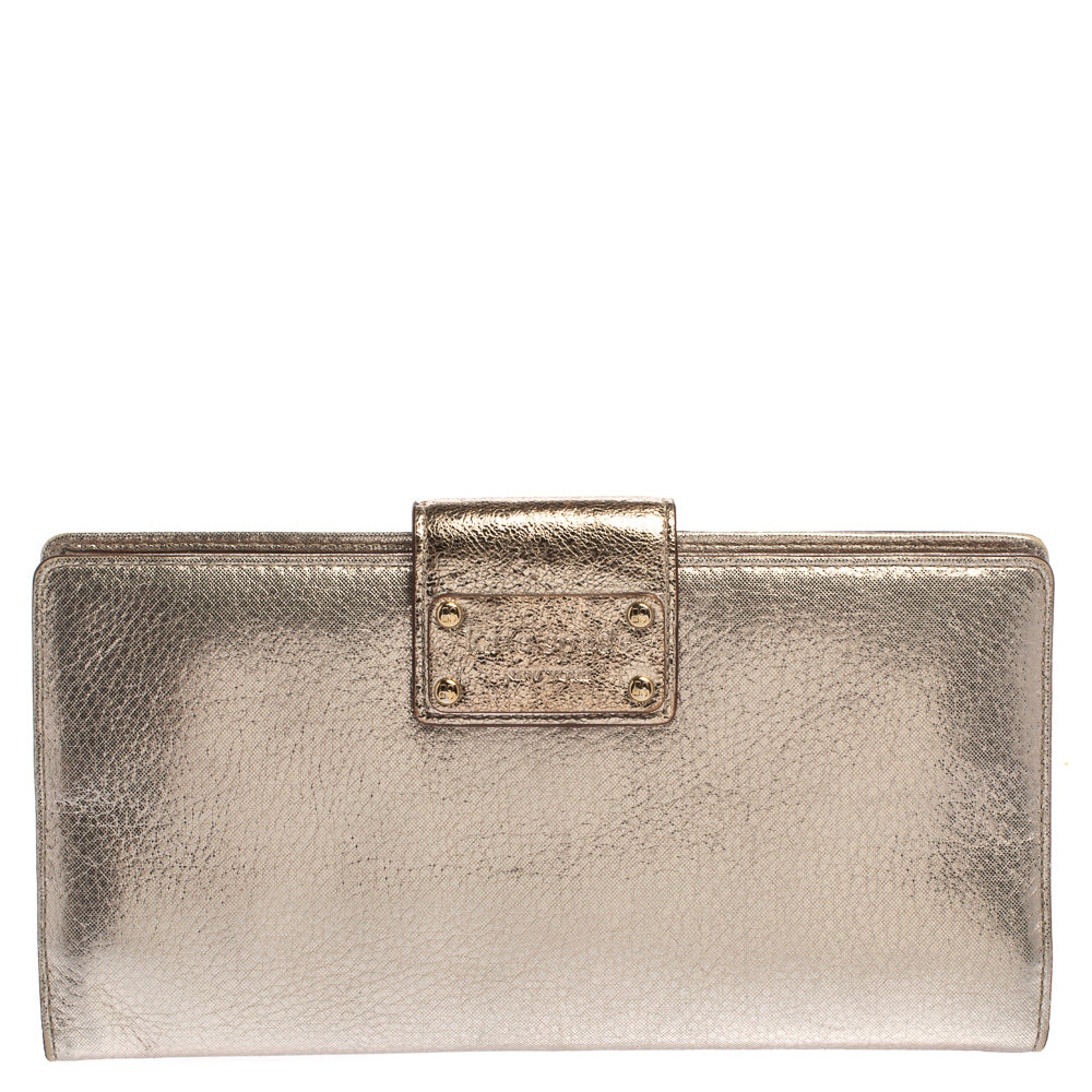 Kate Spade Clutch mit Klappe aus goldschimmerndem Leder