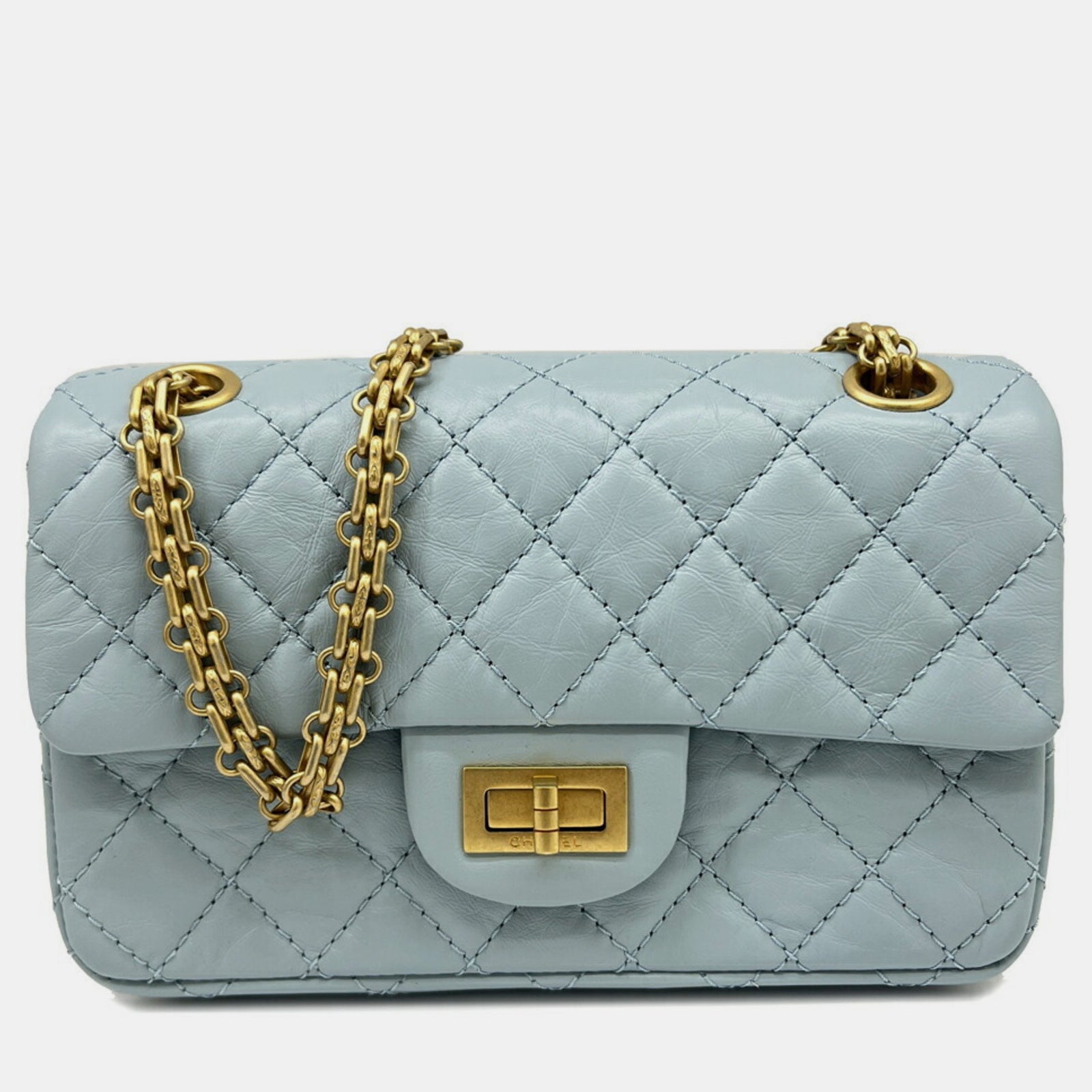 Chanel Hellblaue und goldene 2,55-Handtasche