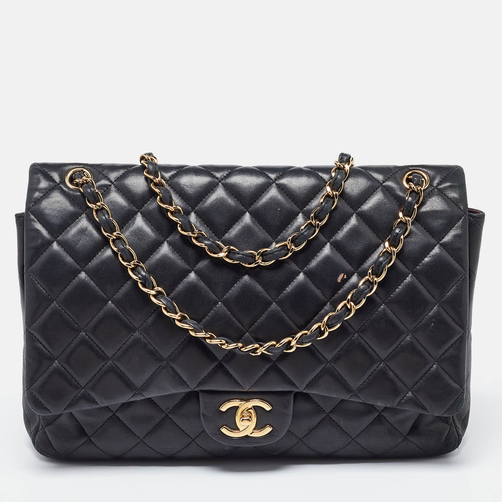 Chanel Sac Maxi Classic à double rabat en cuir caviar matelassé noir