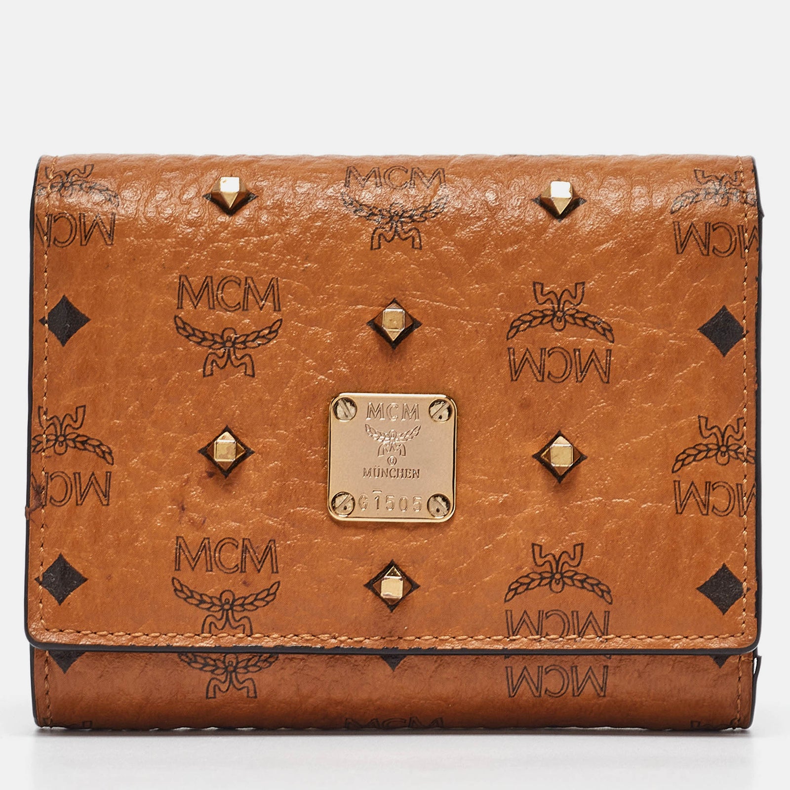 MCM Dreifach gefaltete Brieftasche aus beschichtetem Canvas mit Nieten in Cognac-Visetos