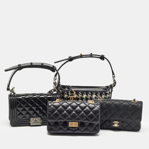 Black Quilted Leather Success Story Trunk and Set of 4 Mini Bags