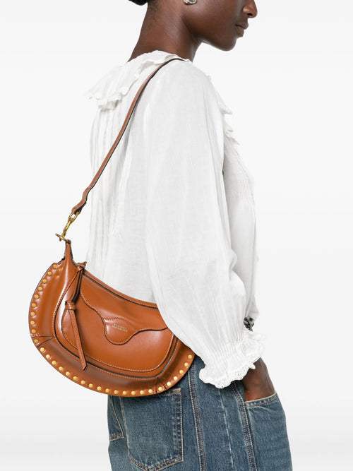 src:https://cdn.drestige.com/prodotti/shp-15975682212224-14/isabel-marant-borse-a-tracolla-donna.jpg