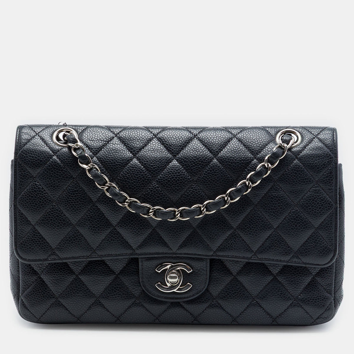 Chanel src:http://cdn.theluxurycloset.com/uploads/products/full/luxury-women-chanel-used-handbags-p1394583-006.jpg