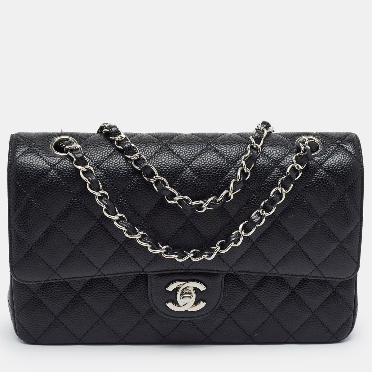 Chanel src:http://cdn.theluxurycloset.com/uploads/products/full/luxury-women-chanel-used-handbags-p1399541-001.jpg