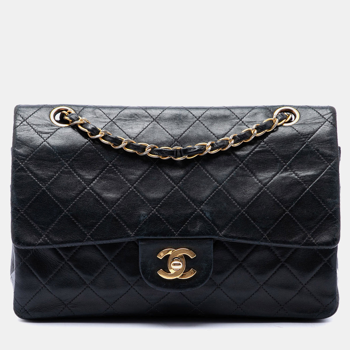 Chanel src:http://cdn.theluxurycloset.com/uploads/products/full/luxury-women-chanel-used-handbags-p1444088-006.jpg