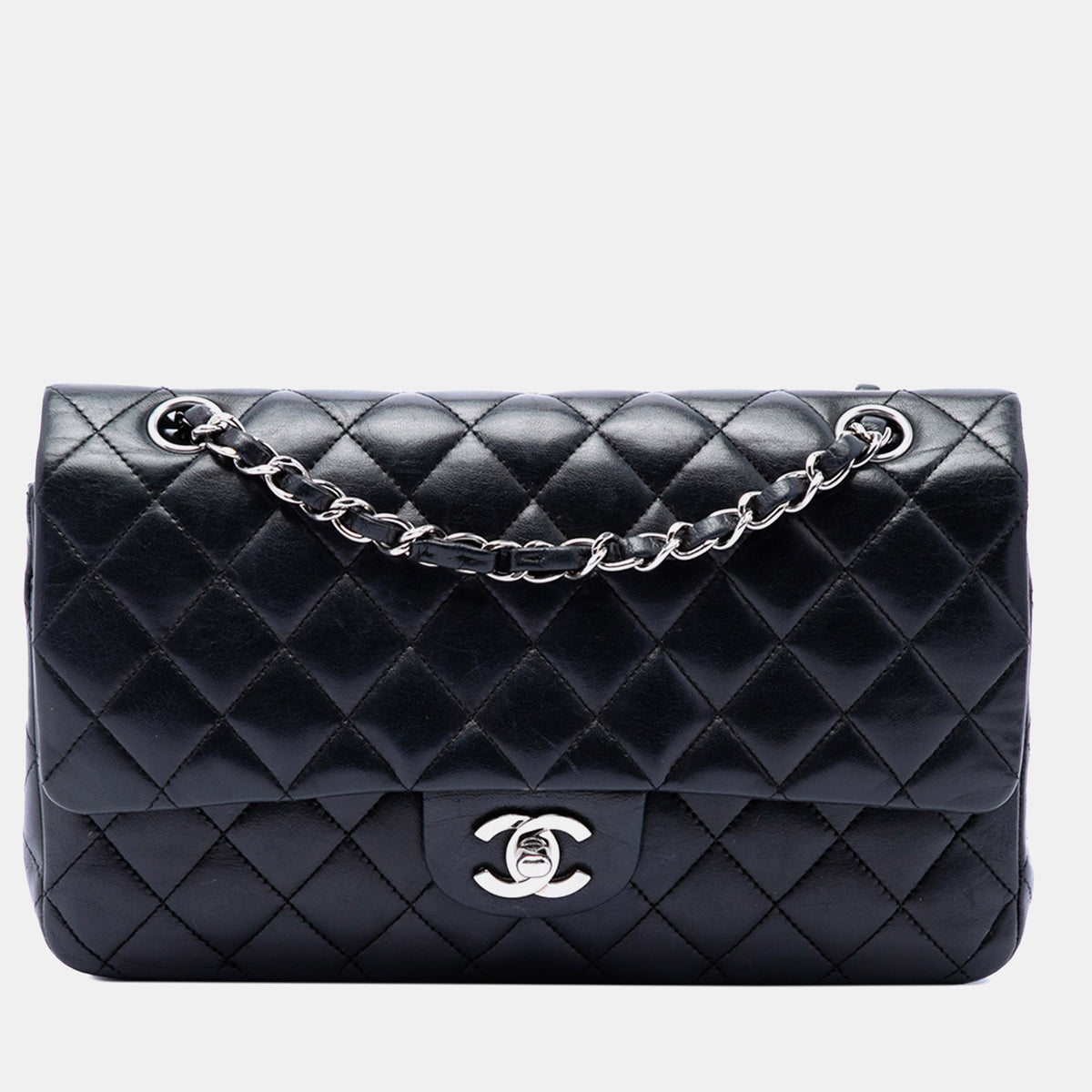 Chanel src:http://cdn.theluxurycloset.com/uploads/products/full/luxury-women-chanel-used-handbags-p1444173-002.jpg