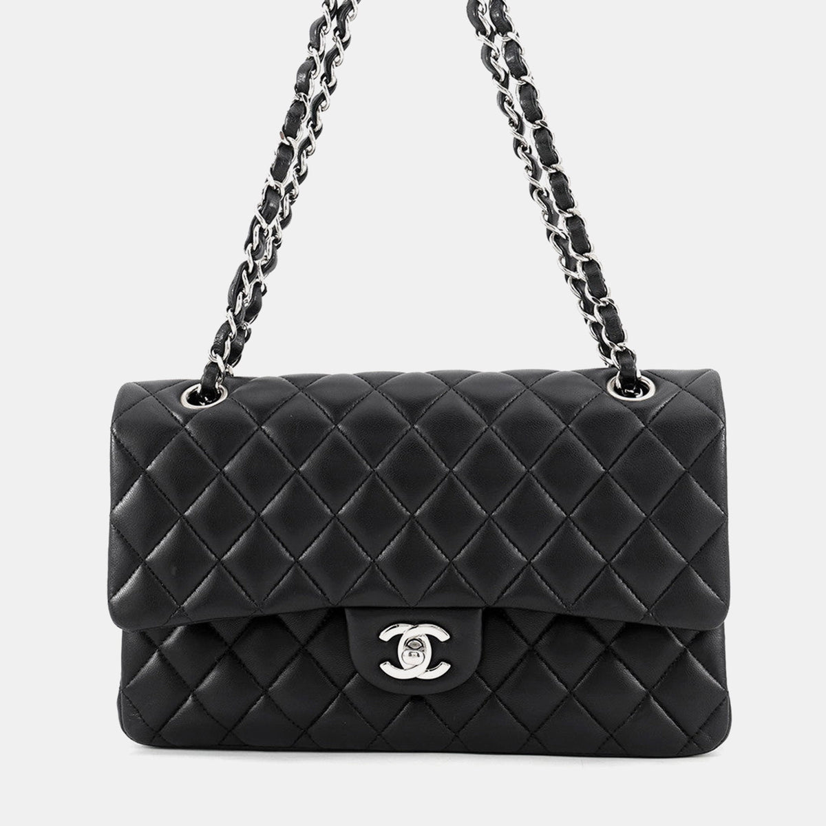 Chanel src:http://cdn.theluxurycloset.com/uploads/products/full/luxury-women-chanel-used-handbags-p1453235-030.jpg