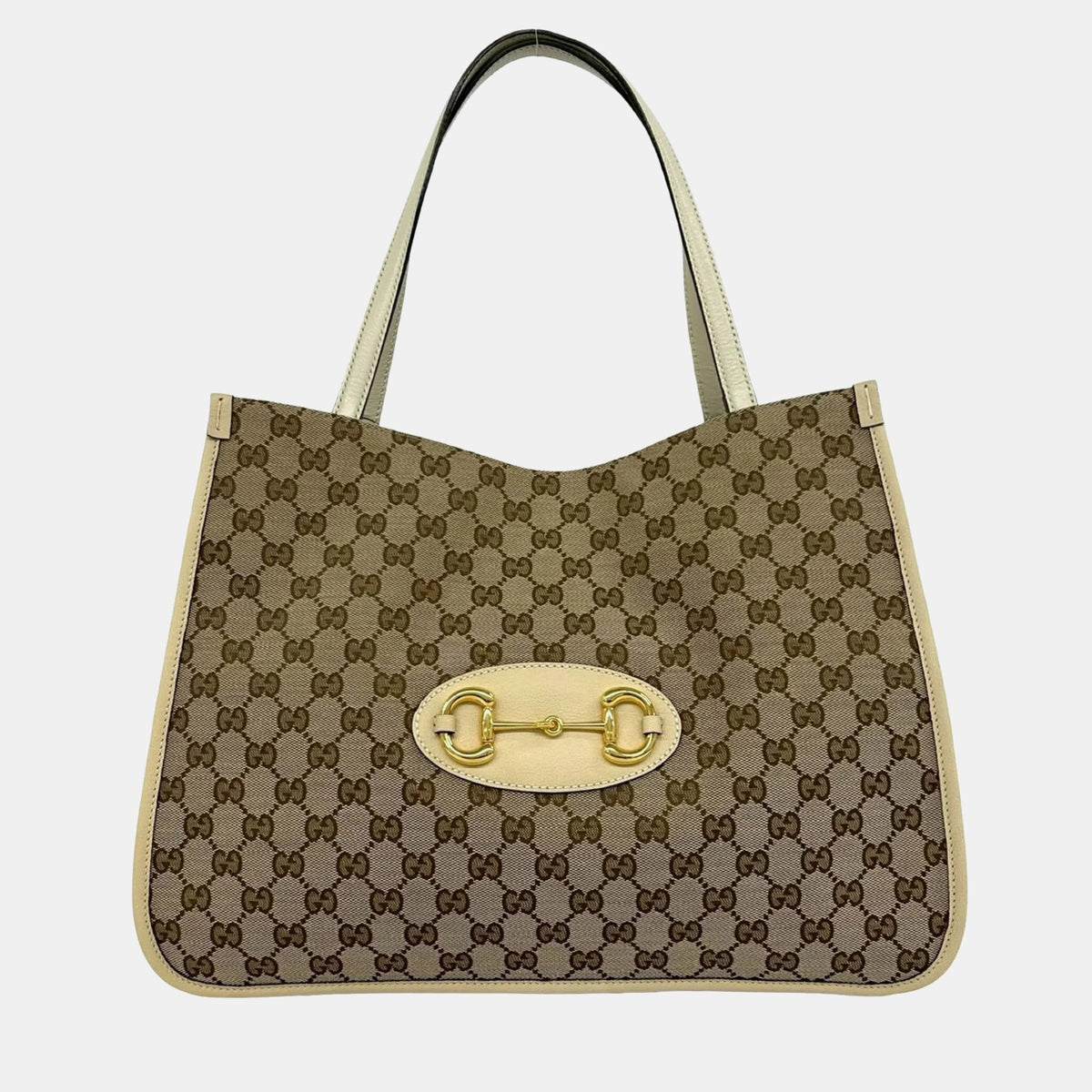 Gucci src:http://cdn.theluxurycloset.com/uploads/products/full/luxury-women-gucci-used-handbags-p1371246-004.jpg