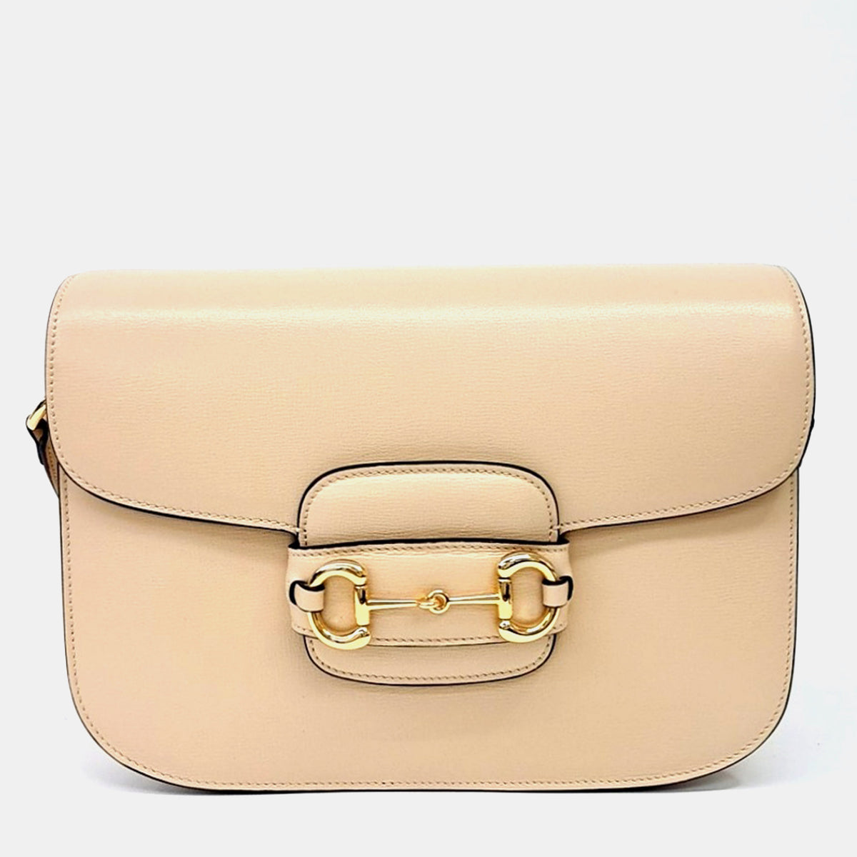 Gucci src:http://cdn.theluxurycloset.com/uploads/products/full/luxury-women-gucci-used-handbags-p1420847-006.jpeg