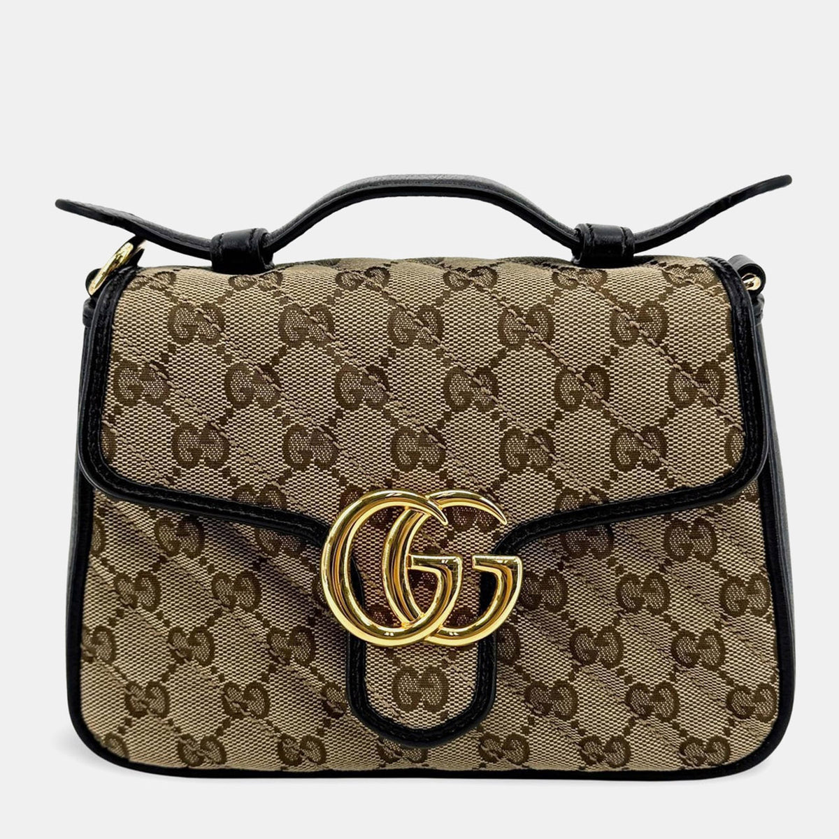 Gucci src:http://cdn.theluxurycloset.com/uploads/products/full/luxury-women-gucci-used-handbags-p1455515-012.jpg