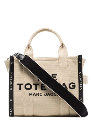 src:https://cdn.drestige.com/prodotti/m0017025263/marc-jacobs-borse-beige.jpg