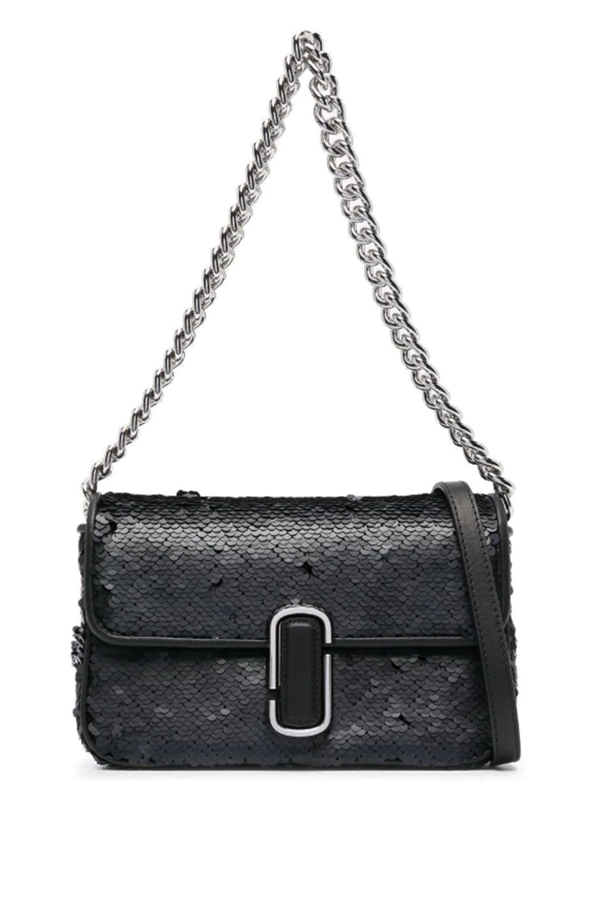 Marc Jacobs src:https://cdn.drestige.com/prodotti/h904m06re22001/marc-jacobs-borse-nero.jpg
